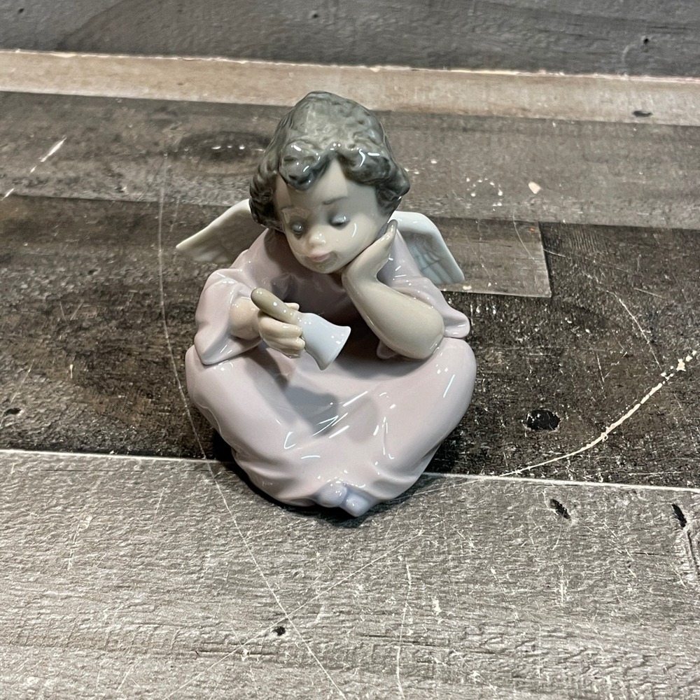 Lladro Curious Angel Figurine 5728 Seated Cherub with Bell Hand Made Spain 1989